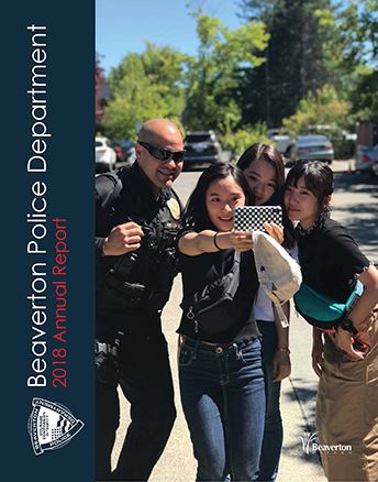 Group of young adults take selfie with sunglasses-wearing BPD Officer graphic link to report. Opens in new window